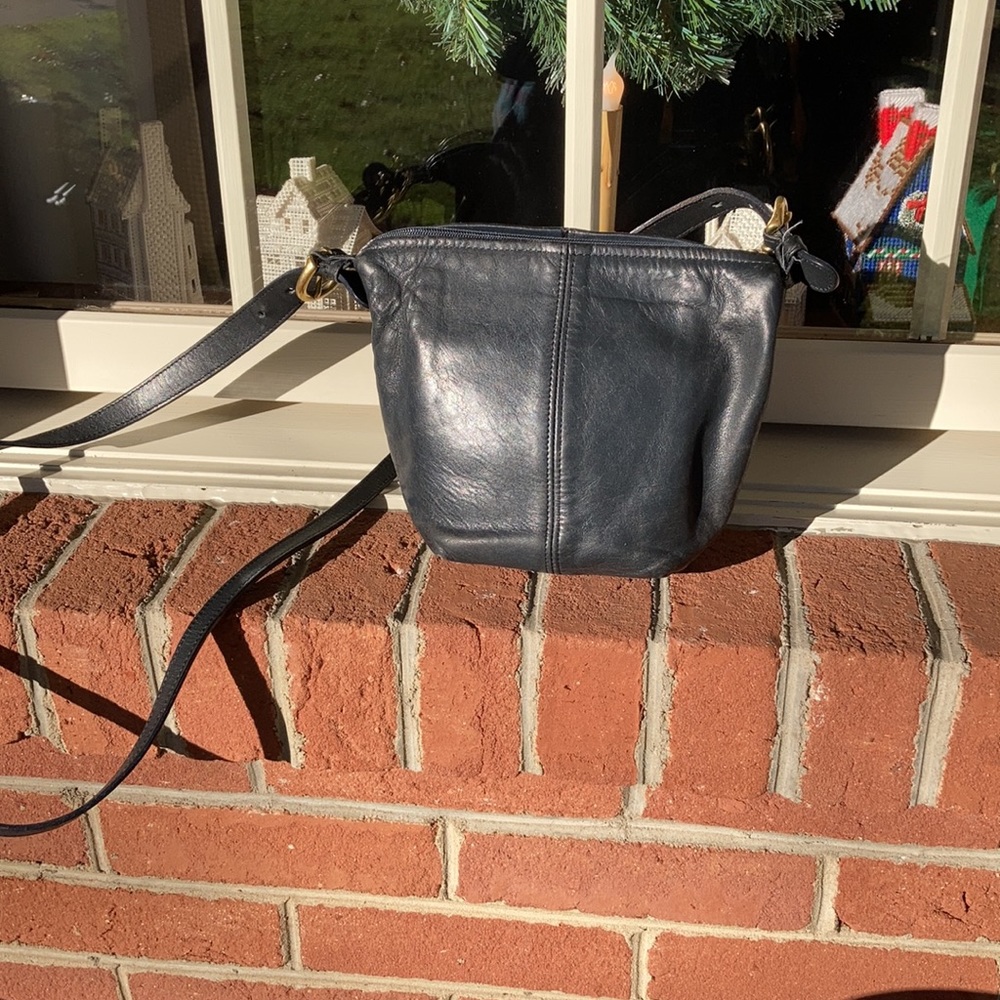 Coach McDougal black vintage soho leather over the shoulder women’s bag.
